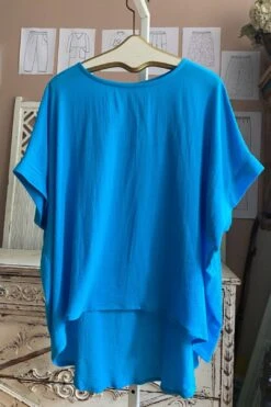 Oversized Curved Hem Top